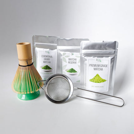 Ceremonial Grade, Matcha Reserve, and Premium Grade Matcha with sifter, bamboo whisk, and whisk holder